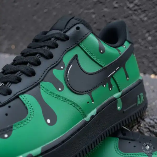 Custom green and black Air Force 1 sneakers with blue splash design.