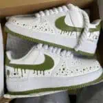 Custom painted Sage Green drip Nike Air Force 1 sneakers.