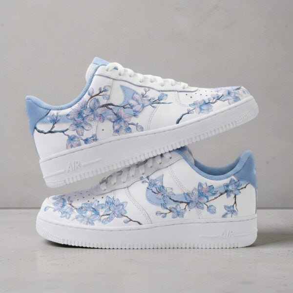 Custom Blue Cherry Blossoms Air Force 1 sneakers with floral design and white base.