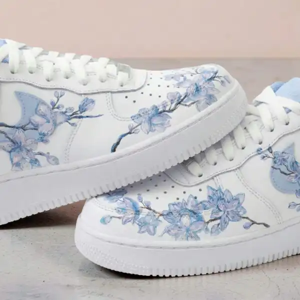 Blue Cherry Blossoms Air Force 1 sneakers with floral design.