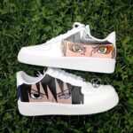 Custom anime eyes design on white AF1 sneakers for unique streetwear style.