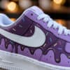 Hand-painted purple AF1 sneakers with ice cream drip design and colorful sprinkles.