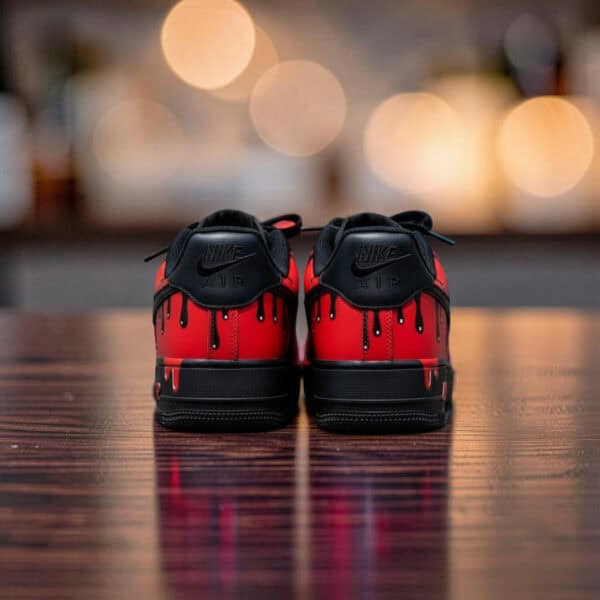Custom green drip design on black Air Force 1 sneakers, stylish and unique footwear.