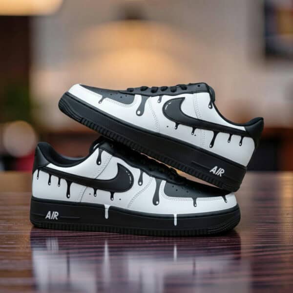 Custom white drip design Air Force 1 sneakers with black accents.