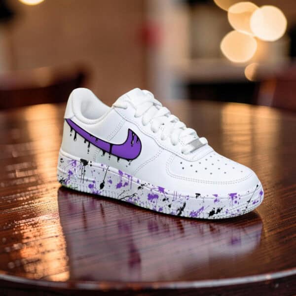 Custom purple drip design on white Air Force 1 sneakers for a bold, stylish look. Perfect for sneake.