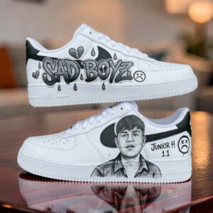 Custom painted Sad Boyz and Junior H themed AF1 sneakers with artistic black and white designs.