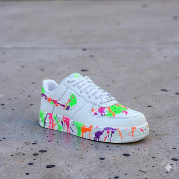 Hand-Painted Splash Air Force 1 sneakers featuring vibrant, multicolored paint splatters on a white.