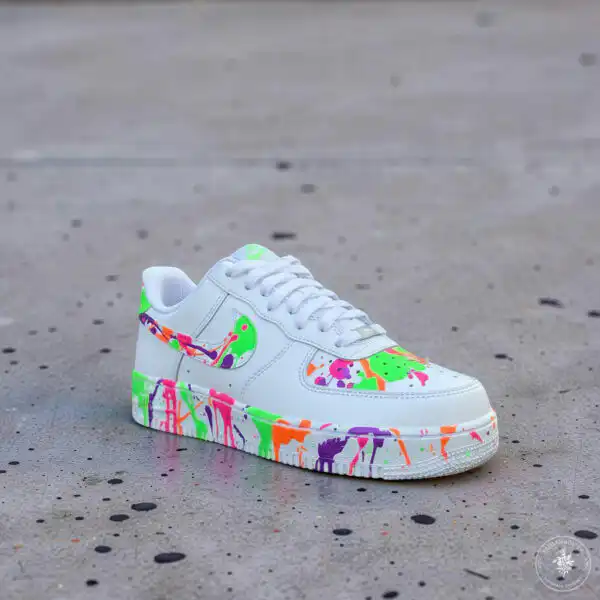 Hand-Painted Splash Air Force 1 sneakers featuring vibrant, multicolored paint splatters on a white.