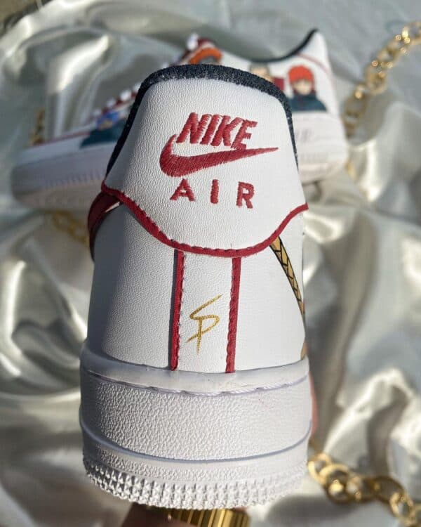 Custom Akatsuki-themed Nike Air Force 1 sneakers with hand-painted details. Unique footwear inspired.