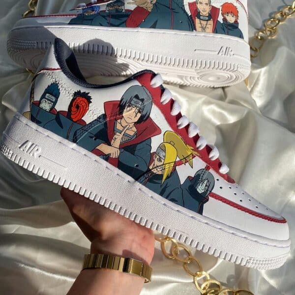 Custom Akatsuki-themed Air Force 1 sneakers with hand-painted Naruto characters. Unique, artistic fo.