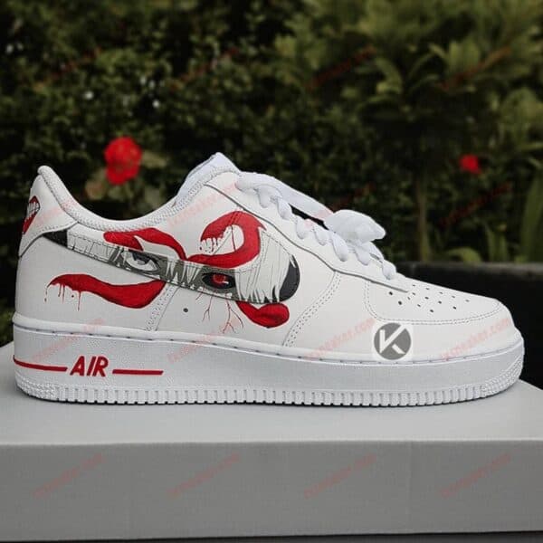 Custom painted white Nike Air Force 1 sneakers featuring a red anime character design.