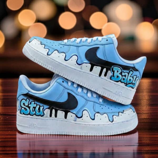 Custom AF1 sneakers with blue paint drip design and personalized text.