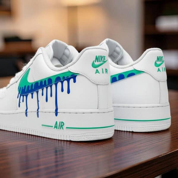 Nike Air Force 1 sneakers with hand-painted blue jade drip design, custom artistic footwear.
