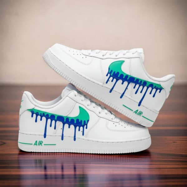 Hand-Painted Blue Jade Drip Air Force 1 Sneakers Custom hand-painted blue jade drip design on white Air Force 1 sneakers.