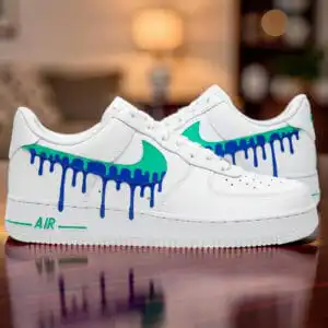 Air Force 1 sneakers with hand-painted blue jade drip design.