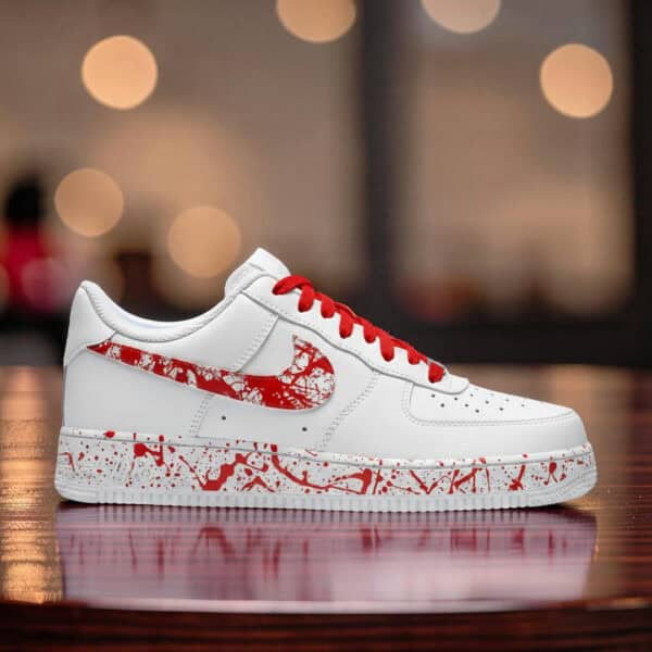 Red Splash Air Force 1 sneakers with hand-painted design and red laces.