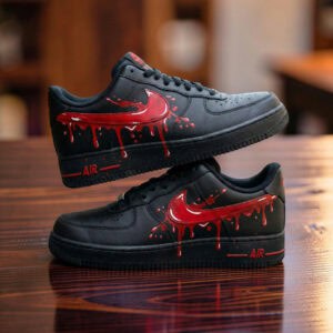Custom painted black Nike Air Force 1 sneakers with red drip design. Unique hand-painted footwear fo.
