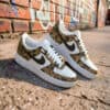 Air Force 1 sneakers with hand-painted duck camo design, stylish and unique footwear.