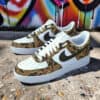 Custom hand-painted duck camo design on classic Air Force 1 sneakers.
