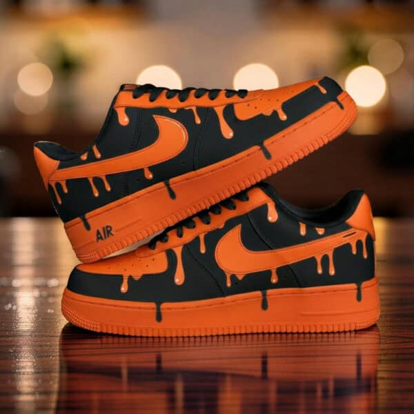 Custom hand-painted orange drip Nike Air Force 1 sneakers with black accents, unique artistic style,.