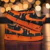 Custom hand-painted orange drip black Nike Air Force 1 sneakers for unique streetwear style. Perfect.