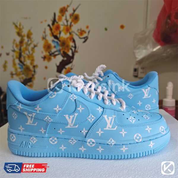 Blue patterned sneakers with white laces.